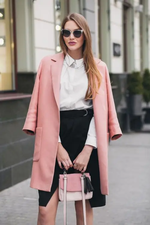 Luxury handbag highlighted in a street-style fashion shoot.